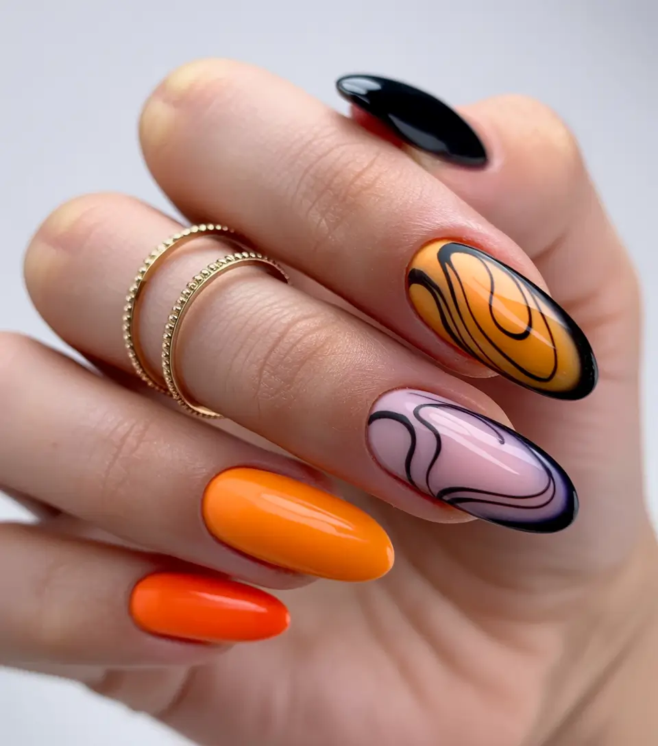 Creative Fall Acrylic Nails Designs 2025 (Short and Long Ideas) Vibrant Orange and Black Swirl