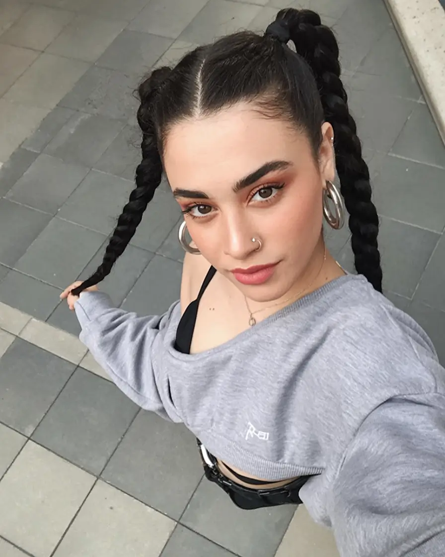 Fall hairstyles ideas 2025 Street-Style Double Braided Ponytails