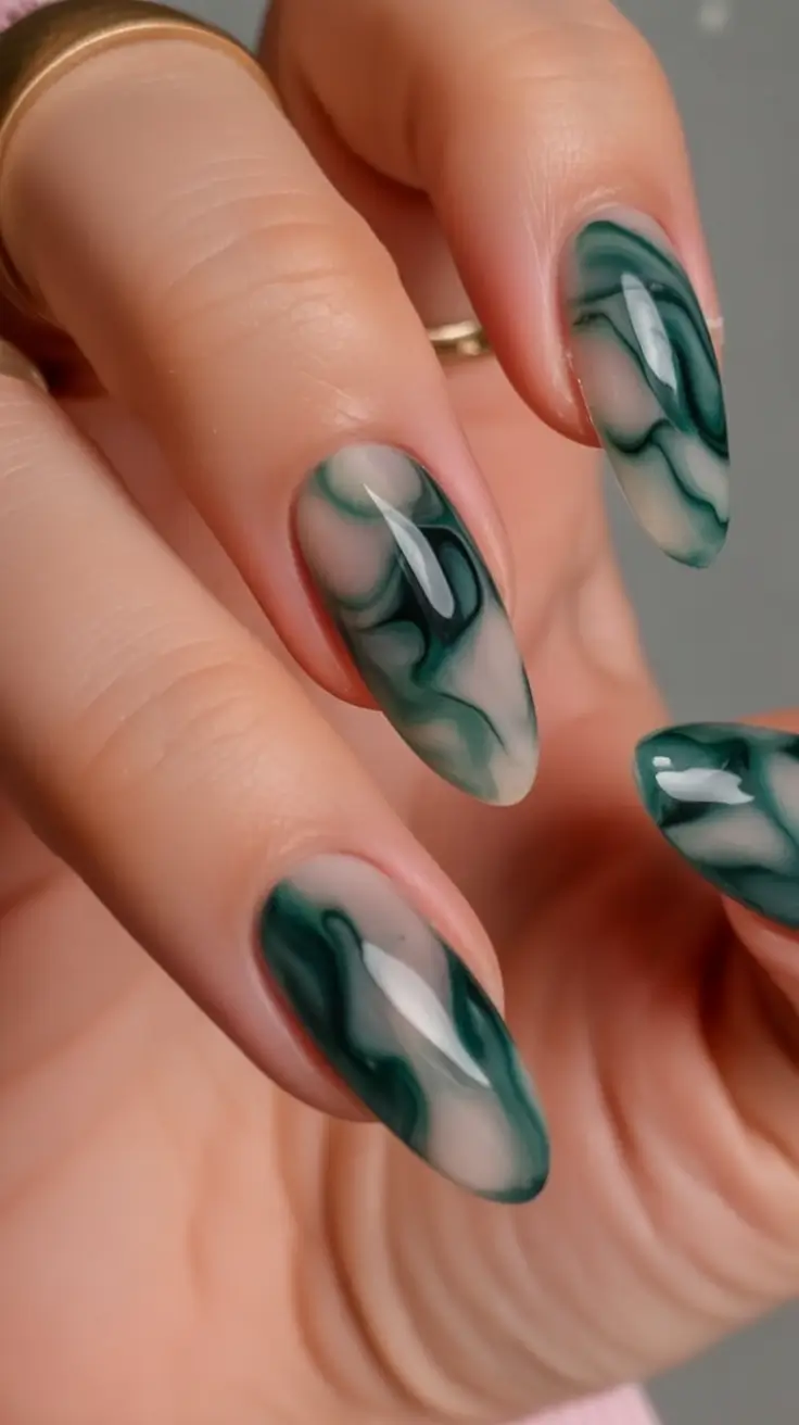 Fall Nail Art Ideas for September 2025 Deep Green Marble Almonds