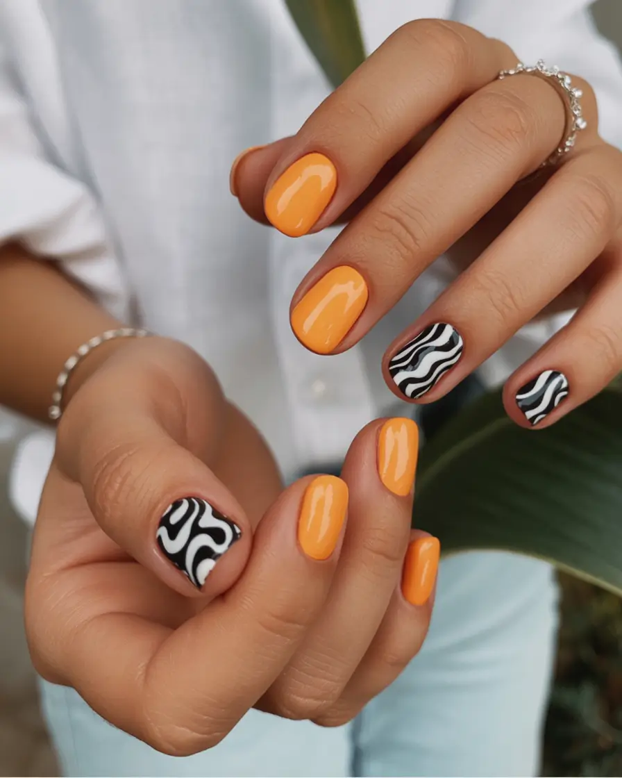 Fall Nail Design Ideas 2025 Orange Pop with Zebra Accents