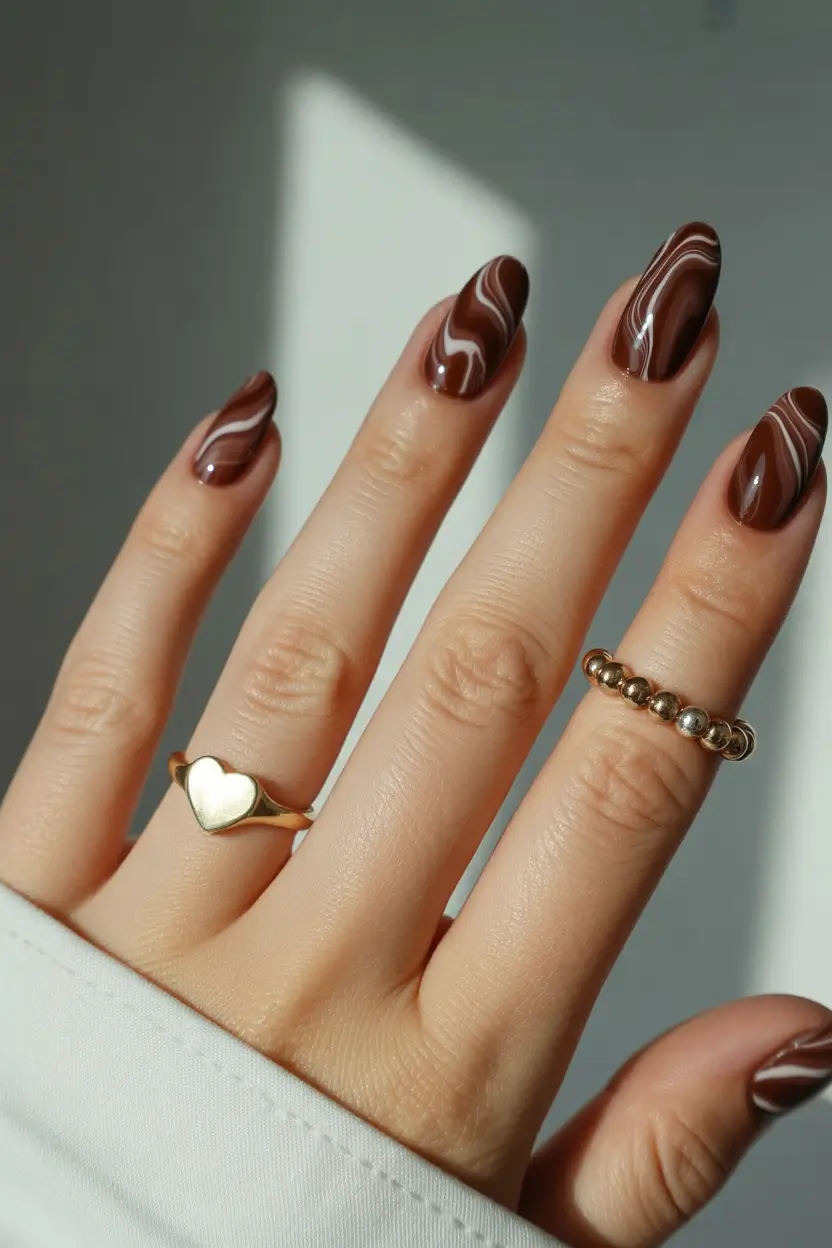 Stylish Brown Fall Nails 2025 – Soft Mocha Swirl Almond Nails