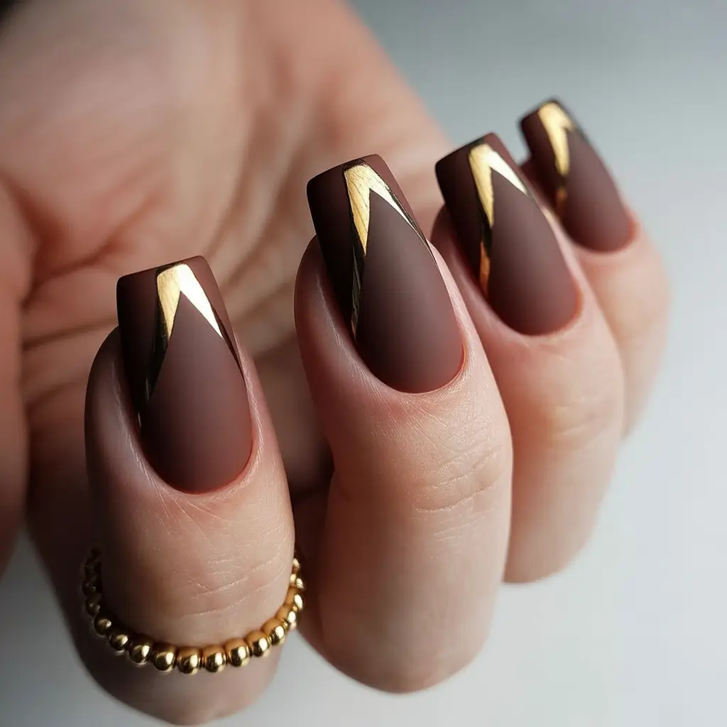 Stylish Brown Fall Nails 2025 – Matte Brown with Golden French V-Tips