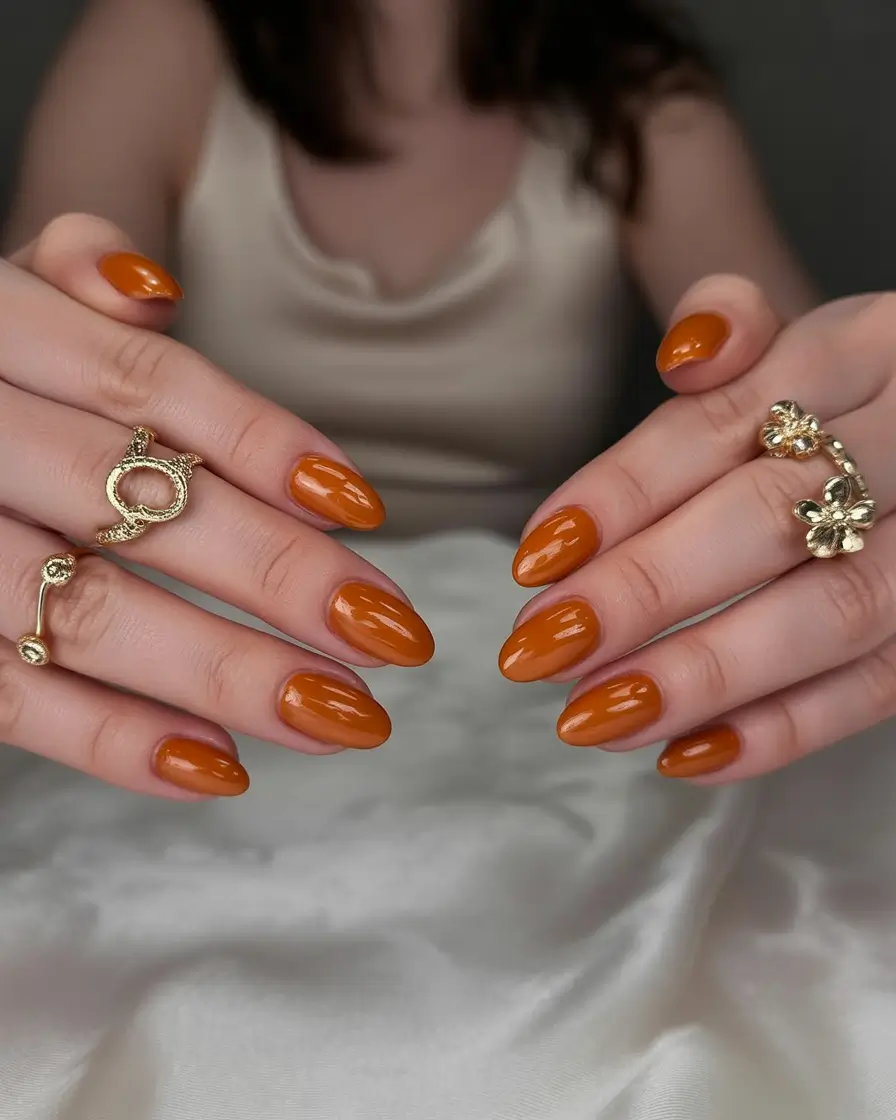 Stylish Fall Oval Shape Nail Designs 2025 Terracotta Glow Oval Nails