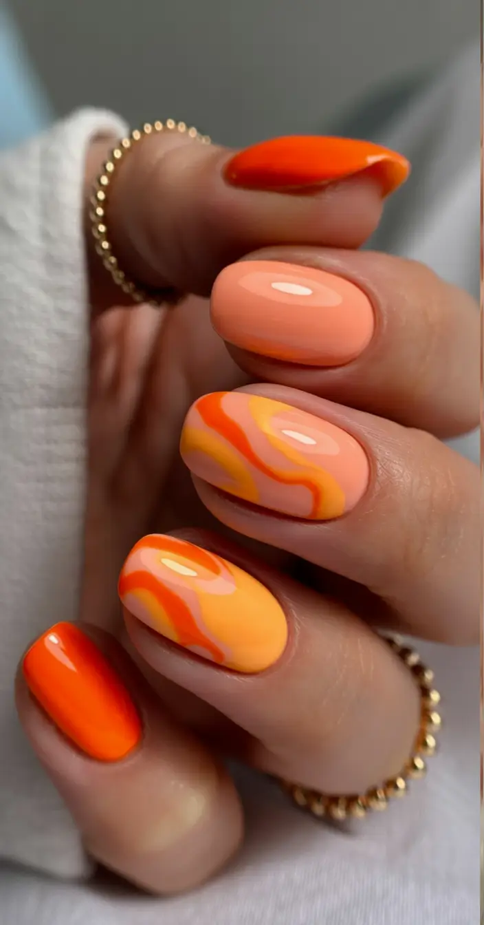 Stylish Fall Oval Shape Nail Designs 2025 Sunset Swirl Oval Nails