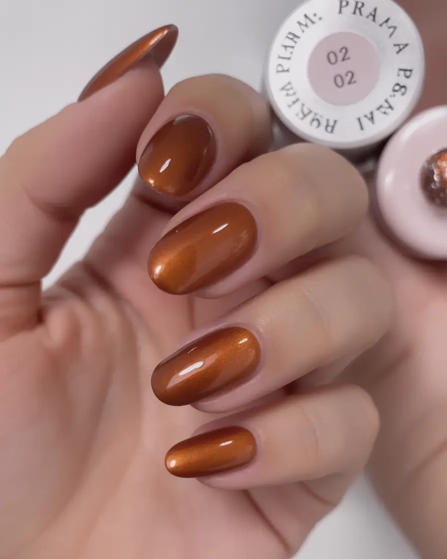 Stylish Fall Oval Shape Nail Designs 2025 Spiced Copper Shine