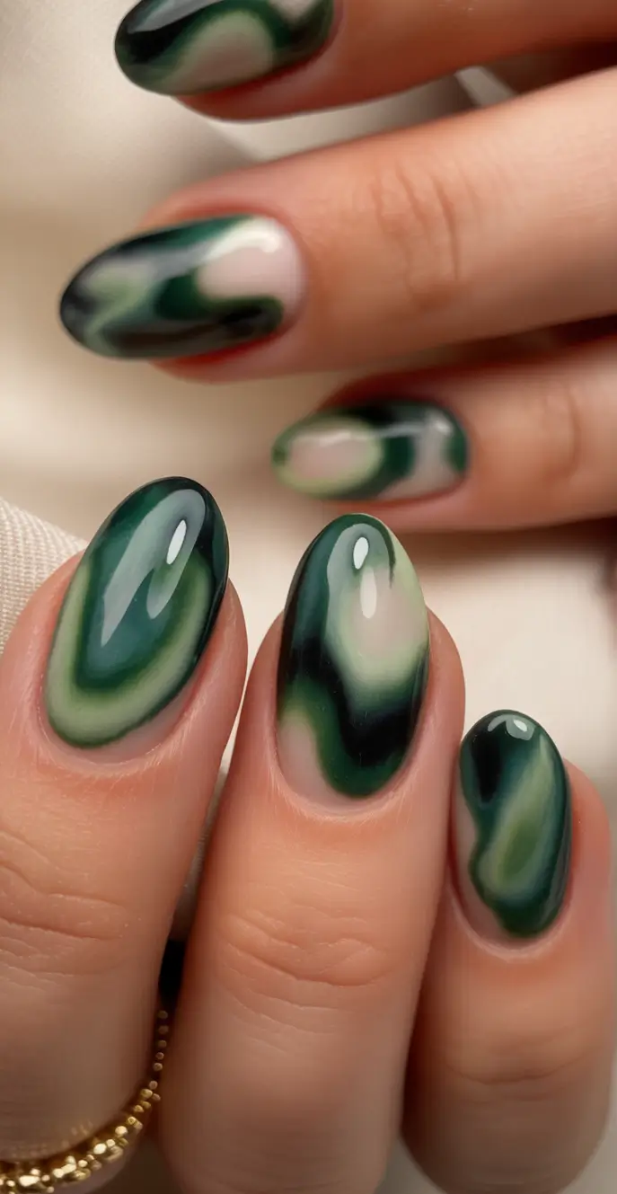 Stylish Fall Oval Shape Nail Designs 2025 Moody Green Marble
