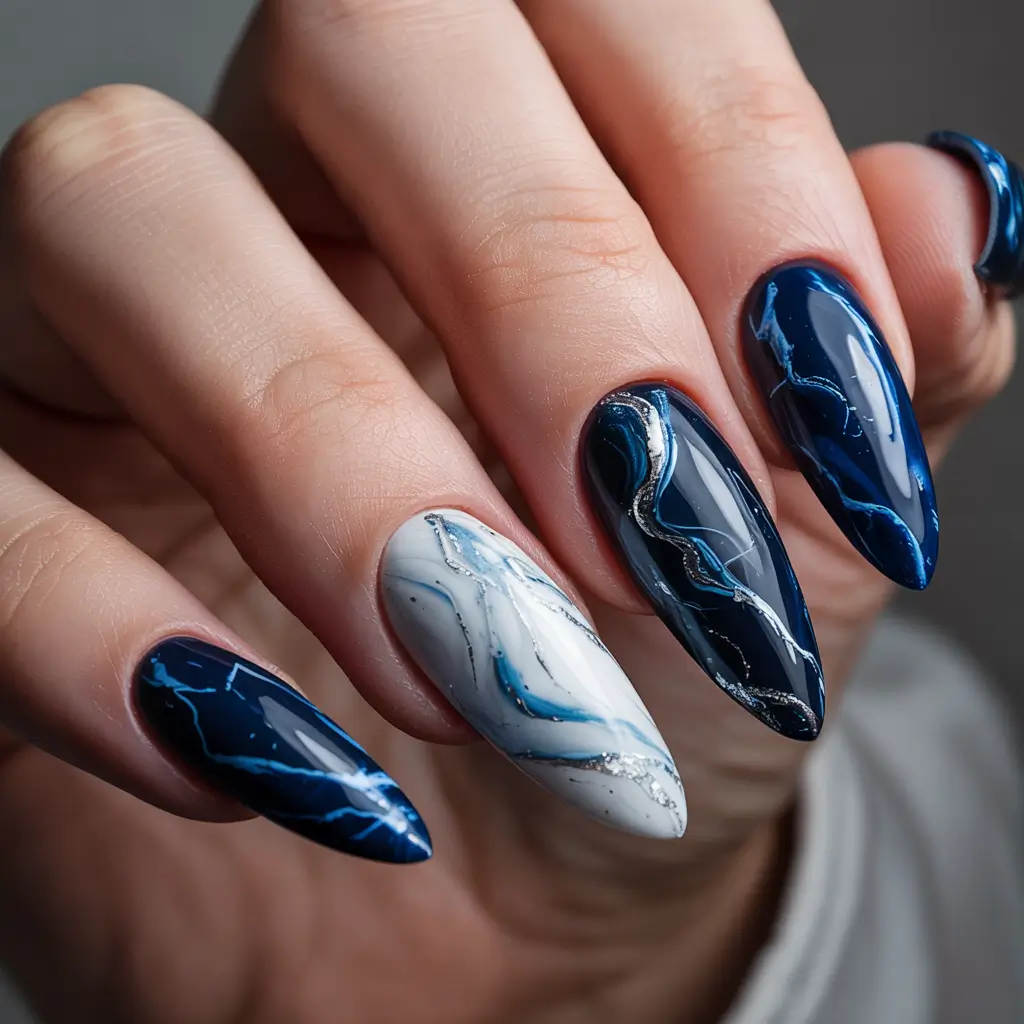 Stylish Nail Ideas for Winter 2025–2026 Midnight Marble Waves