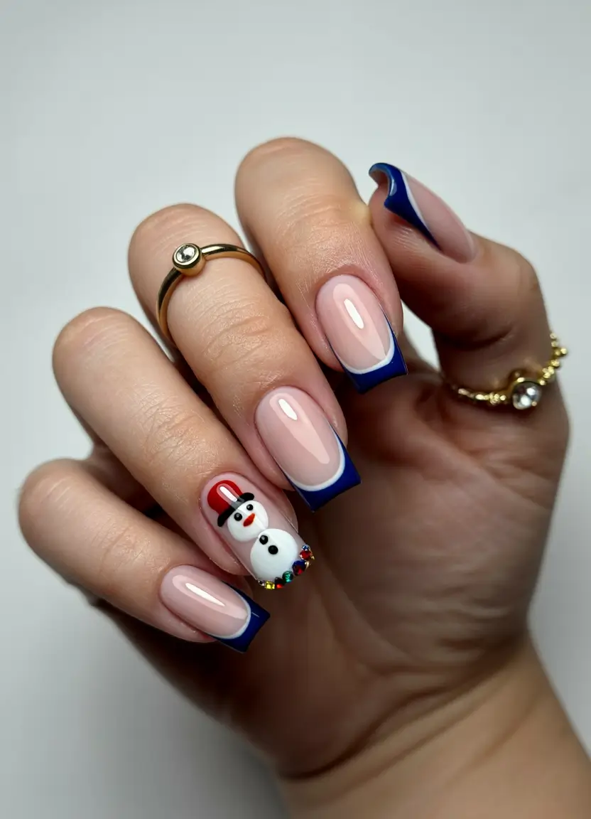 Trendy French Nail Ideas Christmas 2025 Frosty Blue Snowman Tips