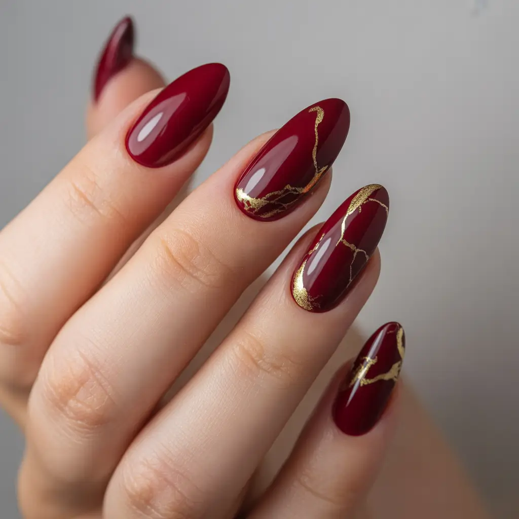 Trendy Manicure Ideas Winter 2025–2026 Golden Veins of Red