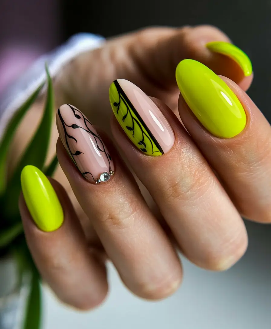 Almond nail art ideas 2026 Neon Green Almond Nails With Nude and Graphic Details