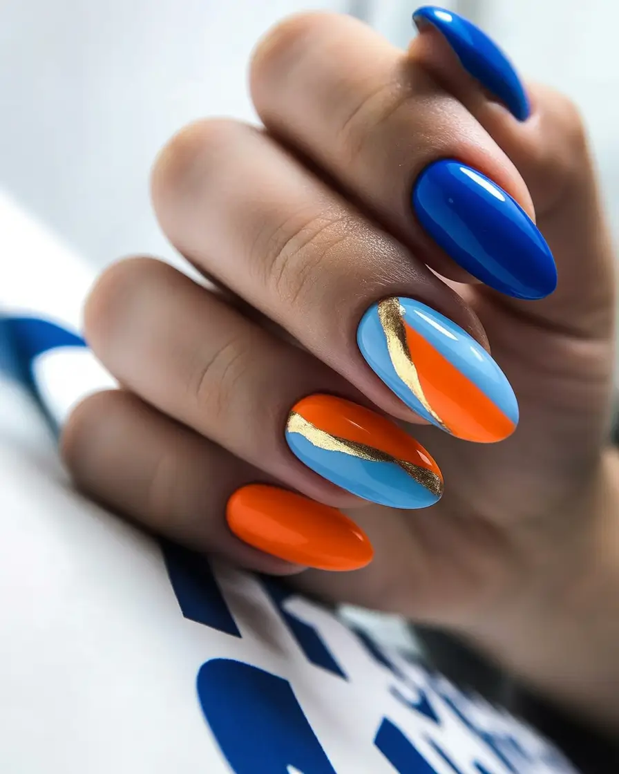 Creative nails inspo 2026 Bold Blue and Orange with Gold Movement