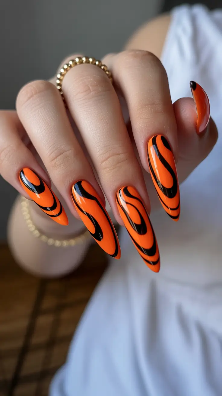 Creative nails inspo 2026 Orange and Black Swirl with High Contrast